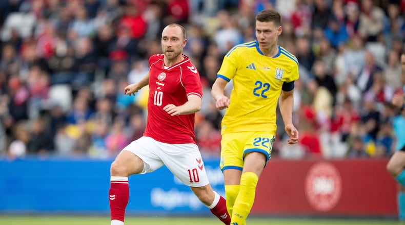 Denmark's Christian Eriksen, left, in action with Ukraine's Mykola Matviyenko during an international football game, in Odense, Denmark, Sunday, June 7, 2026. (Bo Amstrup/Ritzau Scanpix via AP)