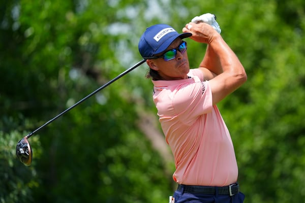 Rickie Fowler hits off the ninth hole during the first round of the Charles Schwab Challenge golf tournament at Colonial Country Club in Fort Worth, Texas, Thursday, May 22, 2025. (AP Photo/LM Otero)