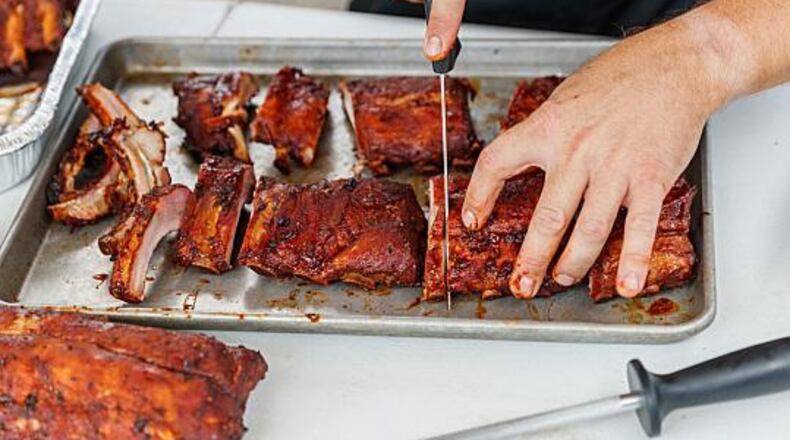 You can eat ribs like these, and other things, at Kennesaw's Pigs & Peaches BBQ Festival on Aug. 19-20.