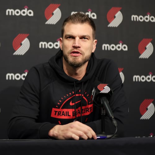Portland Trail Blazers acting head coach Tiago Splitter speaks during a press conference before an NBA basketball game against the Golden State Warriors, Friday, Oct. 24, 2025, in Portland, Ore. (AP Photo/Amanda Loman)