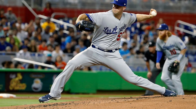 Los Angeles Dodgers' Alex Wood delivers a pitch against the Miami Marlins, Saturday, July 15, 2017, in Miami. (AP Photo/Wilfredo Lee)