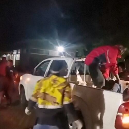 This grab from video provided by Ugandan Red Cross shows injured children being brought in a pickup vehicle to a hospital after an elementary bus crashed Thursday night in the Kapchorwa District in eastern Uganda, Thursday, July 16, 2026. (Ugandan Red Cross via AP)