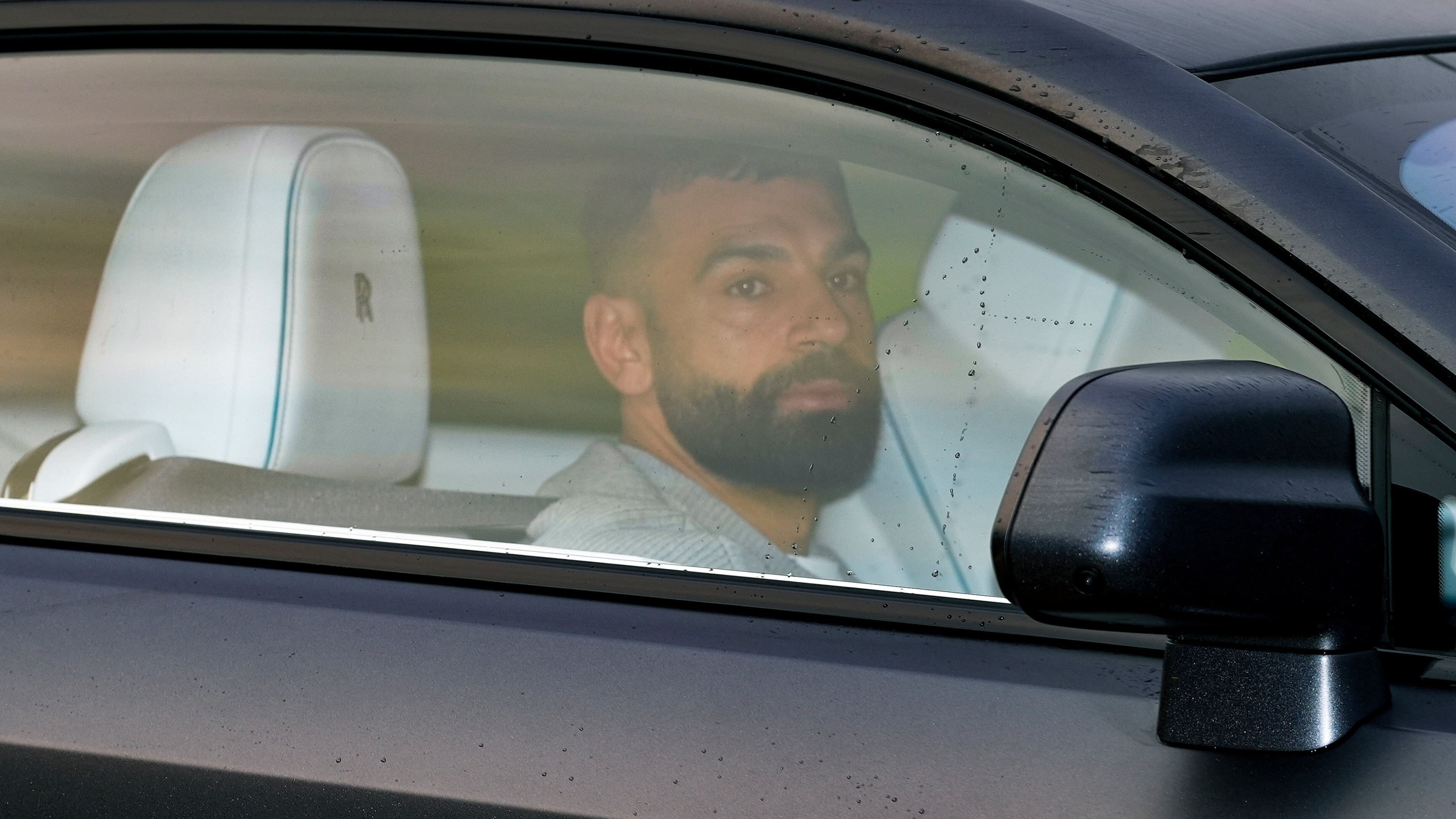 Liverpool's Mohamed Salah arrives at AXA Training Centre, in Liverpool, England, Tuesday Dec. 9, 2025. (Peter Byrne/PA via AP)