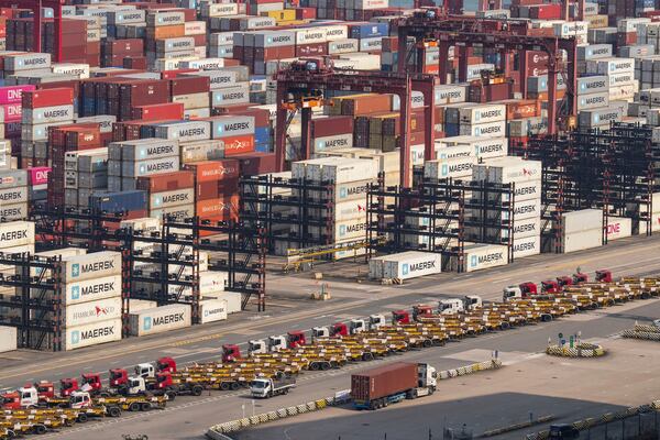 Containers pile up at Kwai Chung Container terminal in Hong Kong, Tuesday, Apr. 8, 2025. (AP Photo/Chan Long Hei)