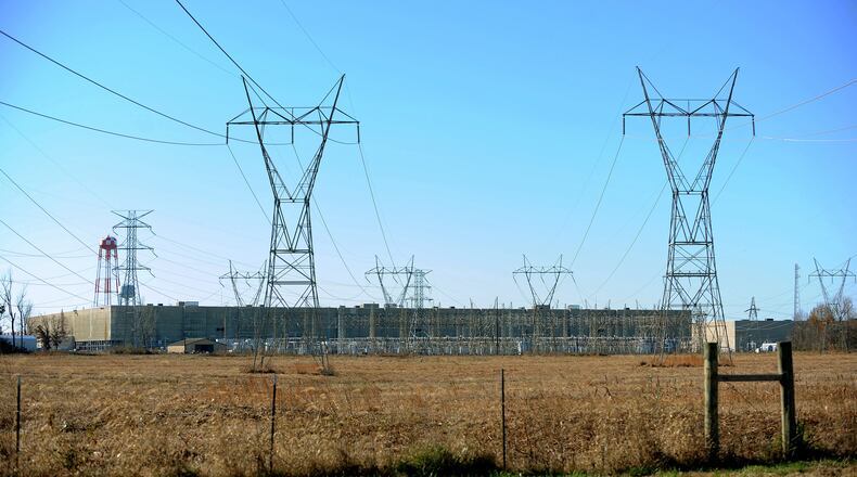 FILE - The Paducah Gaseous Diffusion Plant is seen near Paducah, Ky., Nov. 18, 2013. (AP Photo/Stephen Lance Dennee)