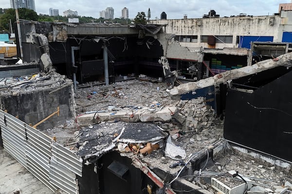 A view of the Jet Set nightclub days after its roof collapsed, killing more than 200 people, in Santo Domingo, Dominican Republic, Friday, April 11, 2025. (AP Photo/Matias Delacroix)