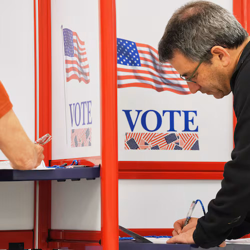 Alan Goldfarb, who said he will be out of town for the general election, casts his ballot on the first day of early voting in Minnesota at the Elections & Voter Services building, Friday, Sept. 18, 2026, in Minneapolis. (AP Photo/Ellen Schmidt)