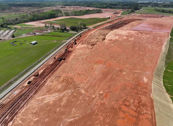 (*UPDATED DRONE PHOTO*) Aerial photograph shows the 2,000-acre Rivian factory site in southern Walton and Morgan counties, Thursday, March 30, 2023, in Social Circle. (Hyosub Shin / Hyosub.Shin@ajc.com)