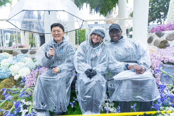 Tyler Blue, right, on the Rose Parade float with one of his doctors, Beomjune Kim from City of Hope Atlanta, far left, and Jodi Cruz, a patient from City of Hope Duarte in Los Angeles. (City of Hope Cancer Center Atlanta)