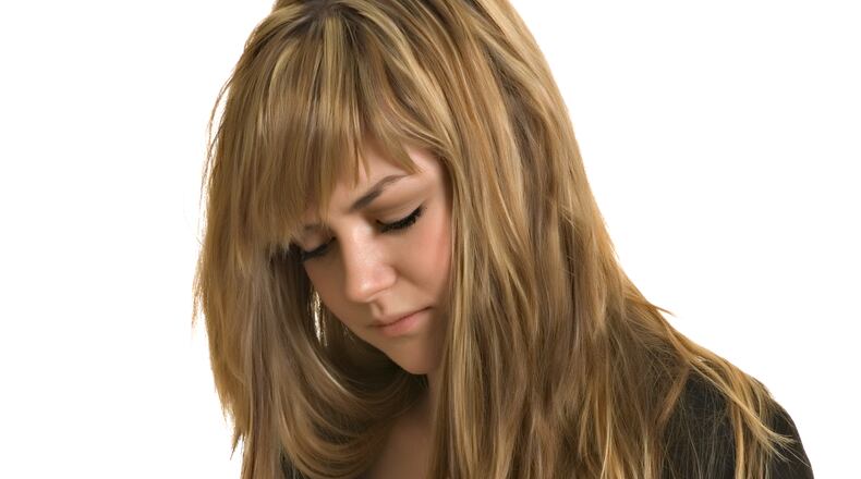 Might as well face it we're addicted to phones. (AJC Photo.)