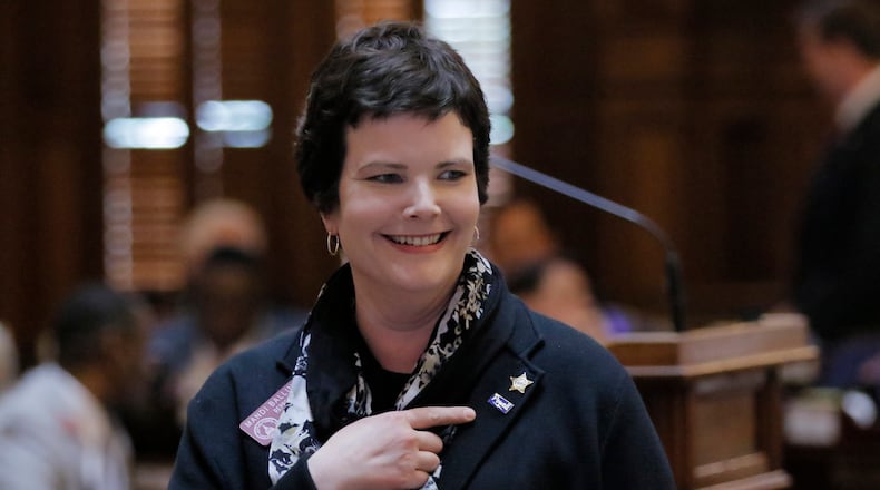Georgia House Juvenile Justice Chairwoman Mandi Ballinger sponsored a House Bill 1358, legislation the chamber passed Friday that would allow Georgians to carry handguns without first obtaining a license. “We need to protect ourselves,” the Republican from Canton said, “and this bill allows us to do so without having to pay money to the government to do it.” BOB ANDRES /BANDRES@AJC.COM
