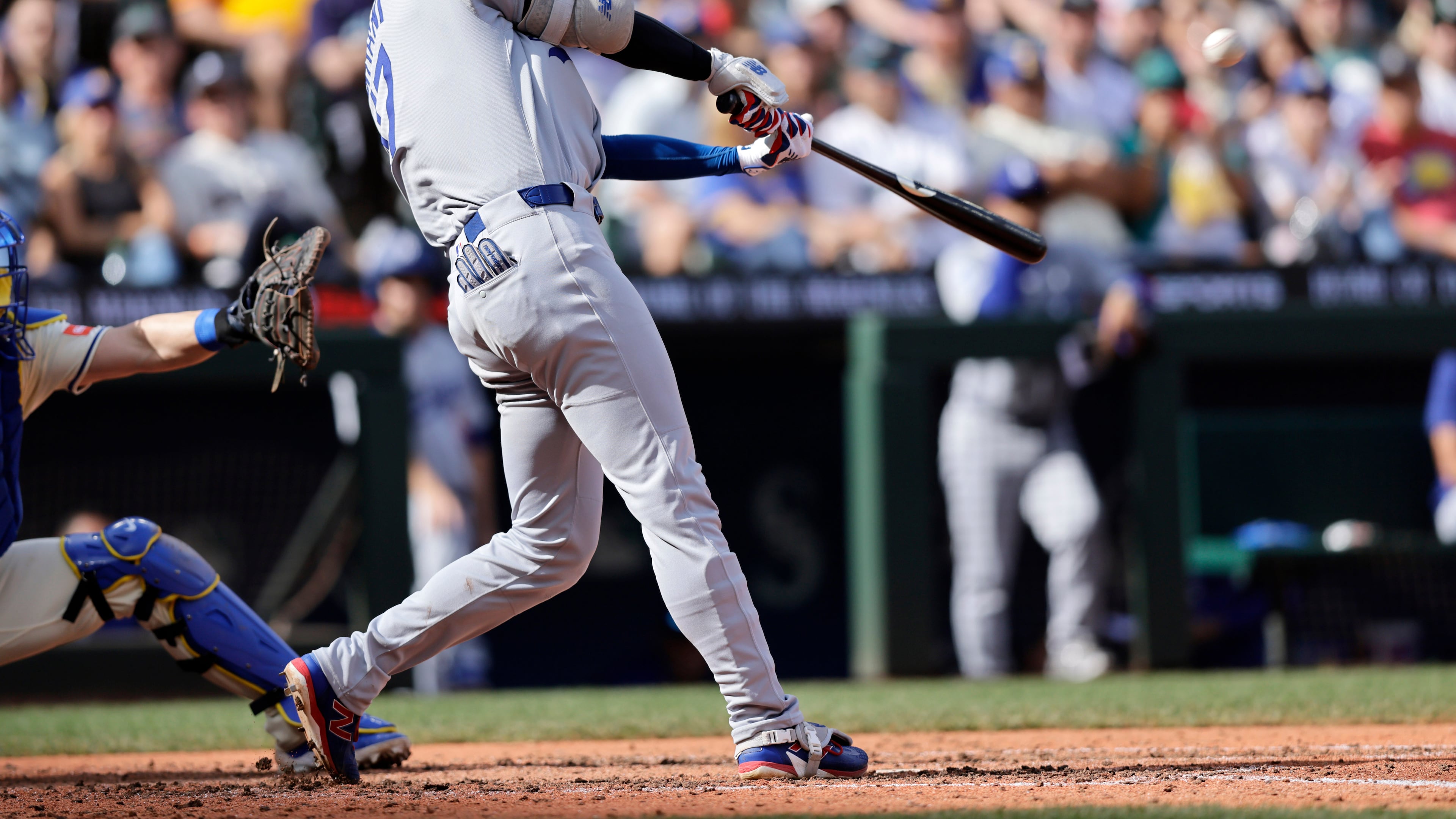 Los Angeles Dodgers' Shohei Ohtani hits a solo home run off Seattle Mariners pitcher Caleb Ferguson during the seventh inning of a baseball game Sunday, Sept. 28, 2025, in Seattle. (AP Photo/John Froschauer)