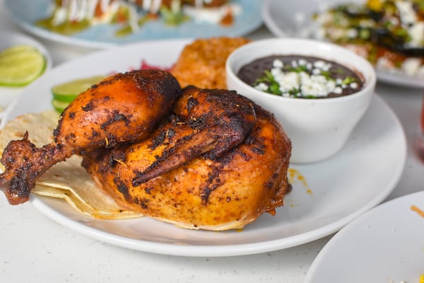 Rotisserie chicken is featured on the menu of Birdcage in Grant Park. Courtesy of Liz Attaway/@adventuresinatlanta