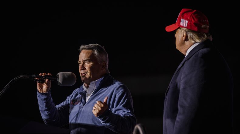 Rep. Jody Hice (R-Ga.) campaigns in Georgia’s Secretary of State Republican primary as Donald Trump looks on, at a  rally in Commerce, Ga., March 26, 2022. The midterms may well affect the fate of free and fair elections in the country. Hice has falsely argued that rampant voter fraud marred the 2020 Georgia election and said he would not have certified Joe Biden’s victory there. (Audra Melton/The New York Times)..