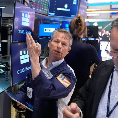 Bobby Charmak works on the floor at the New York Stock Exchange in New York, Tuesday, April 7, 2026. (AP Photo/Seth Wenig)