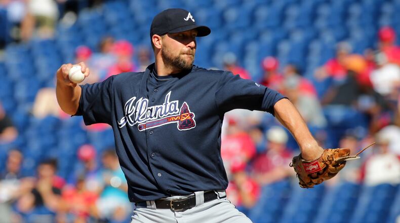 Jim Johnson throws a pitch in the eighth inning during Sunday's game against the Phillies.