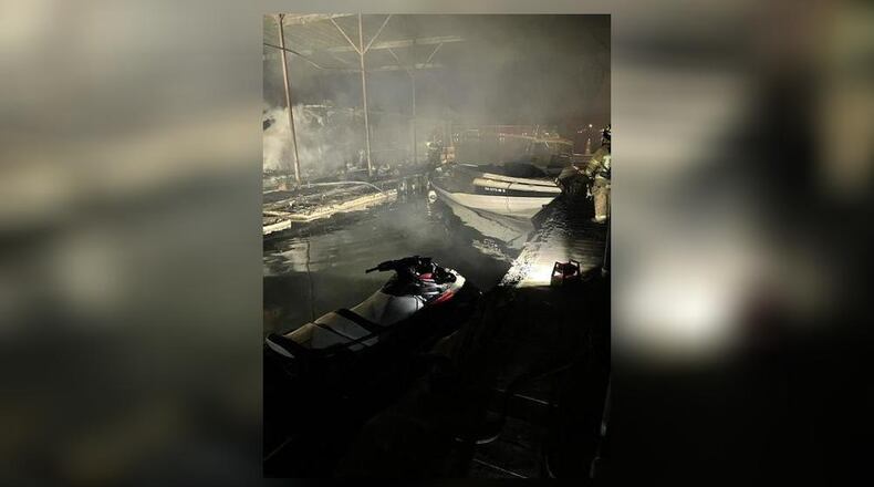 Four boats and two water scooters caught on fire Tuesday night at the Holiday Marina on Lake Lanier.
