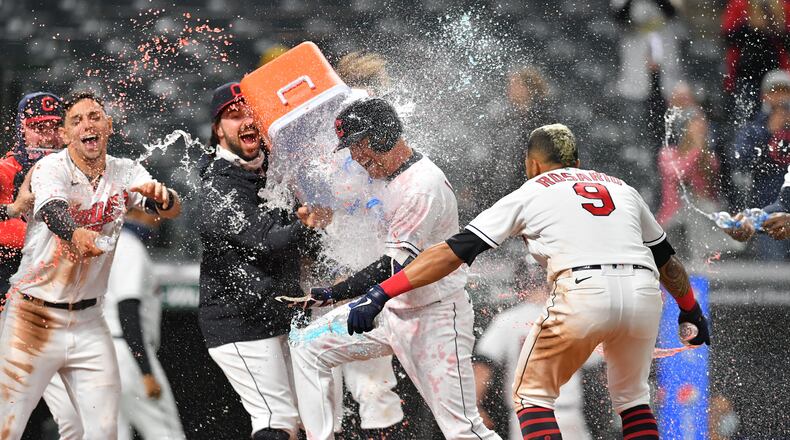 Jordan Luplow, who signed a one-year deal with the Braves on Monday, celebrates with his Cleveland teammates after hitting a walk-off home run during the 2021 season. (Jason Miller/TNS)