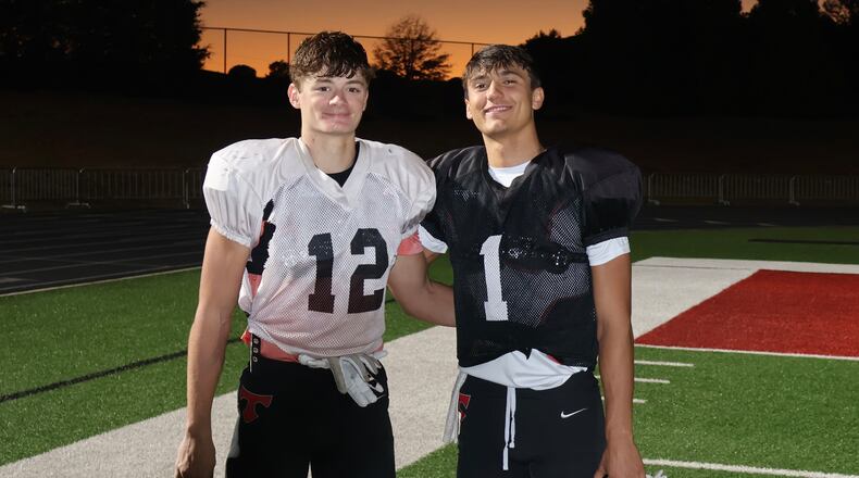 North Oconee's Landon Roldan and Harrison Faulkner pose for a photo after a football practice. (Photo credit: Jack Keys)