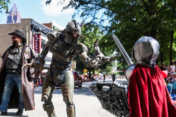 Thousands lined up along Peachtree Street for the annual Dragon Con Parade in Atlanta on Saturday, Aug. 30, 2025. (Abbey Cutrer/AJC)