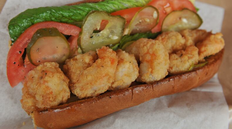 Shrimp po' boy with lettuce, tomato, pickle, cajun mayonnaise and hoagie roll at Star Provisions. (BECKY STEIN)