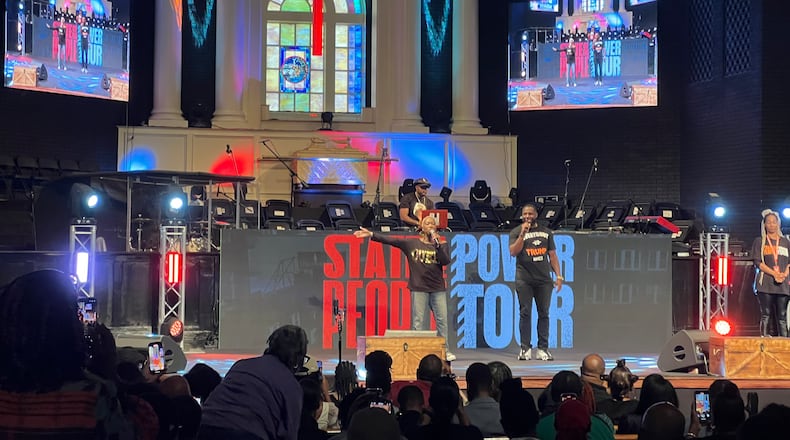 Joy-Ann Reid, political commentator and former host of “The ReidOut” MSNBC show, speaks at the rally held at the dReam Center Church in Decatur.