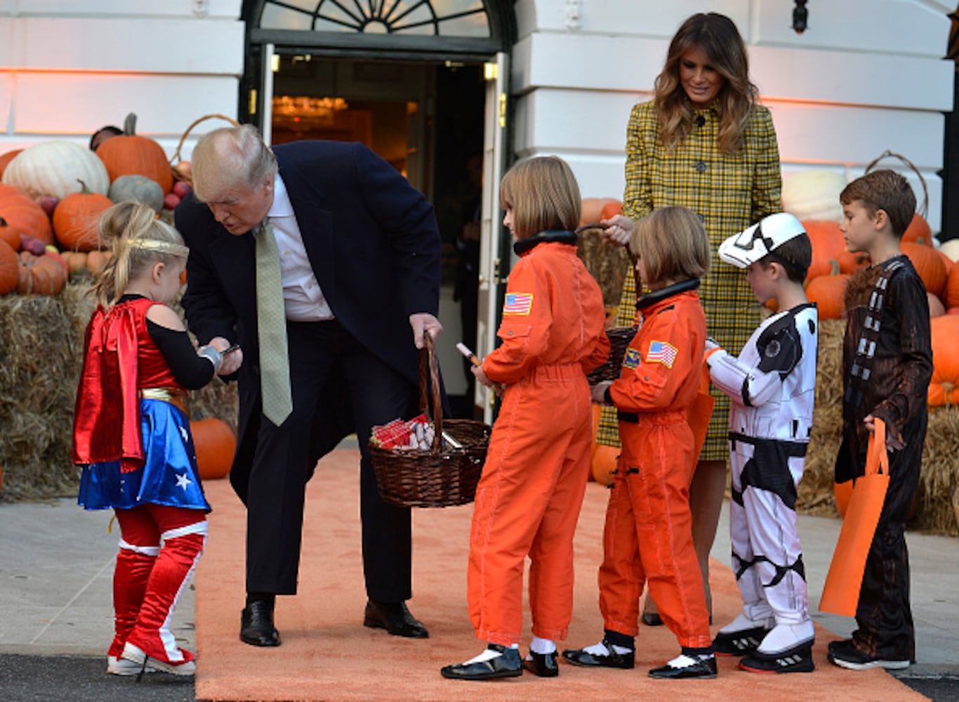 Photos: President Trump, first lady Melania Trump welcome children to White House for Halloween