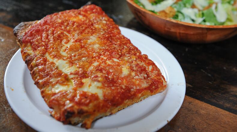 Brooklyn Sicilian slice and caesar salad at O4W Pizza. (BECKY STEIN PHOTOGRAPHY)