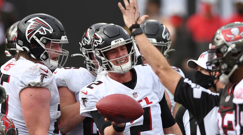 Atlanta Falcons quarterback Matt Ryan (2) celebrates his score against the Tampa Bay Buccaneers during the second half Sunday, Jan. 3, 2021, in Tampa, Fla. (Jason Behnken/AP)