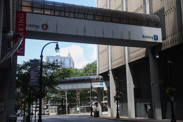 Critics argue that skybridges suck life off the sidewalks and privatize public space. (Abbey Cutrer/AJC)
