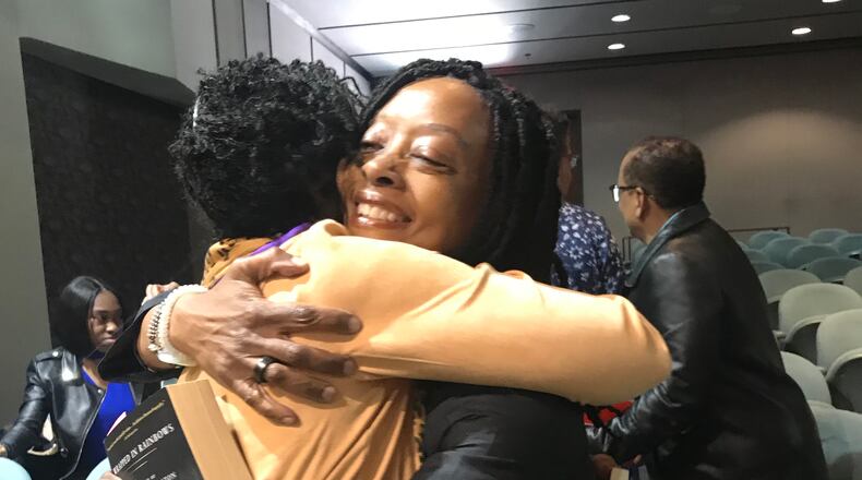 Valerie Boyd (right) embraces author Tina McElroy Ansa at the Clark Atlanta University Annual Black Writers Conference in 2019 where they were both presenters. Courtesy of Georgene Bess Montgomery
