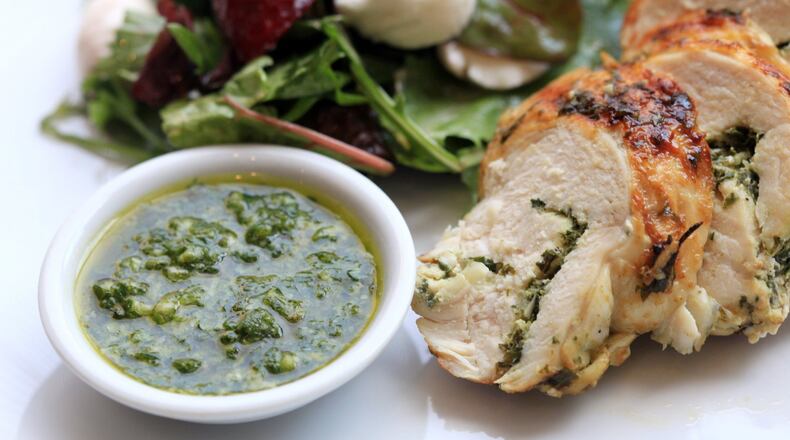 Grilled Pesto Chicken with Berry Salad. (Susan Tusa/Detroit Free Press/TNS)