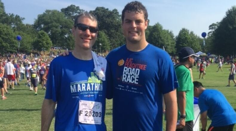 Former Georgia Tech offensive lineman Trey Braun (right) with father-in-law David DiSalvo at the 2016 AJC Peachtree Road Race. (Courtesy Trey Braun)