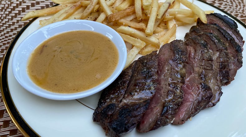 The steak frites from Tiny Lou's are a reliable entree choice. Ligaya Figueras/ligaya.figueras@ajc.com