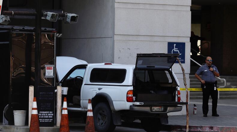 A heavily armed man drove this truck to the Edward R. Roybal Federal Building in downtown Los Angeles on Wednesday before he was stopped by security officers who noticed a firearm in his vehicle.