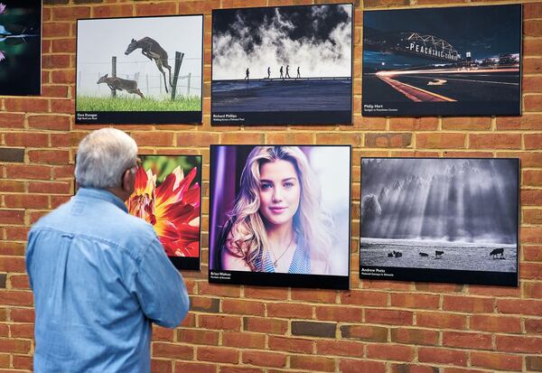 The Peachtree Corners Photography Club photo exhibit Hero Wall. Photo courtesy of Brian Walton Photography