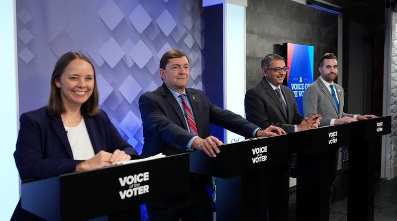 From left, U.S. Senate candidates Shenna Bellows, Troy Jackson, Dr. Nirav Shah, and Jordan Wood prepare for their televised debate at the WCSH-6 studio Thursday, July 16, 2026, in Portland, Maine. (AP Photo/Robert F. Bukaty)