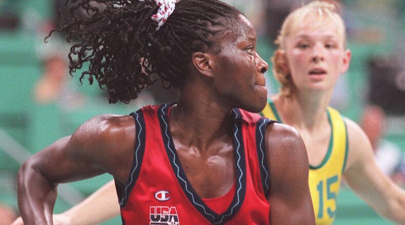 Katrina McClain of the U.S. women's basketball team grabs a rebound in game against Australia Friday, Aug. 2, 1996 during the 1996 Summer Olympic Games in Atlanta.
