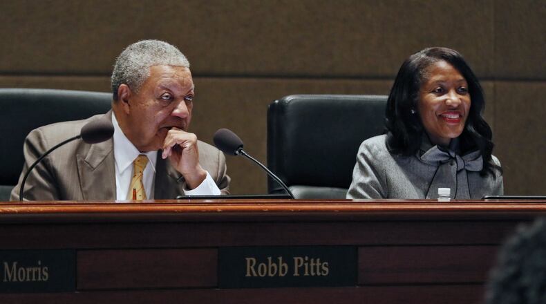 Robb Pitts (left), the chair of the Fulton County commission, and Natalie Hall a commissioner, voted to decriminalize marijuana in the unincorporated part of the county. BOB ANDRES /BANDRES@AJC.COM AJC FILE PHOTO
