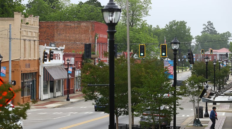 Downtown Sparta is mostly quiet on Wednesday. Sparta is the county seat of Hancock County, which now has the fourth highest number of COVID-19 cases per capita in Georgia. (PHOTO by Curtis Compton ccompton@ajc.com)