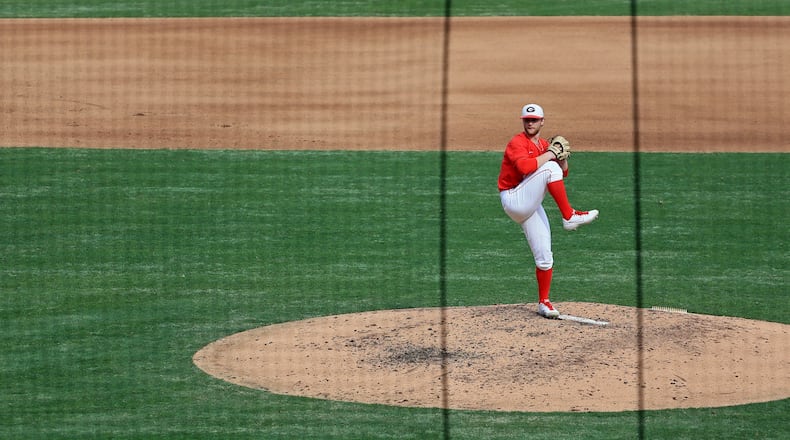 Georgia's C.J. Smith delivers a pitch against Georgia Tech on Sunday, March 1, 2020, at Coolray Field in Lawrenceville. The Bulldogs won 9-3.