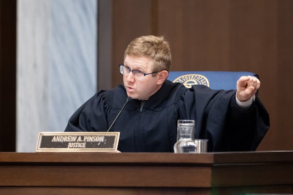 Georgia Supreme Court Justice Andrew Pinson speaks during a hearing in September 2024. (Arvin Temkar/AJC)