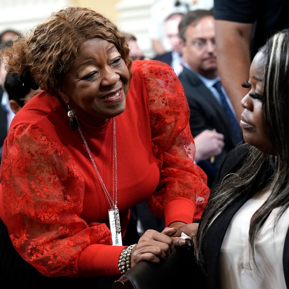 Former Fulton County election worker Ruby Freeman talks to her daughter, Wandrea ArShaye "Shaye" Moss, a former Georgia election worker, after she testified before the U.S. House Select Committee at its fourth hearing on its Jan. 6 investigation on Capitol Hill in Washington, D.C., on Tuesday, June 21, 2022. (Yuri Gripas/Abaca Press/TNS)