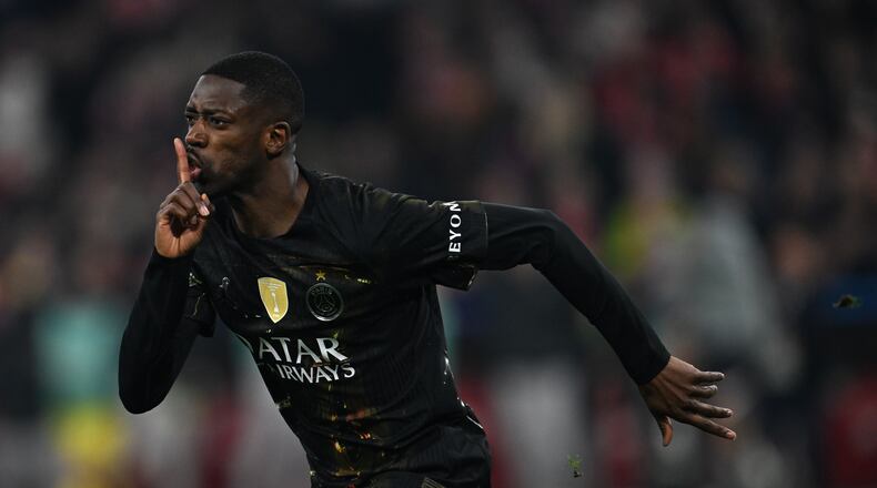 PSG's Ousmane Dembele celebrates after scoring their first goal during the Champions League semifinal second leg soccer match between Bayern Munich and Paris Saint Germain in Munich, Germany, Wednesday, May 6, 2026. (Sven Hoppe/dpa via AP)