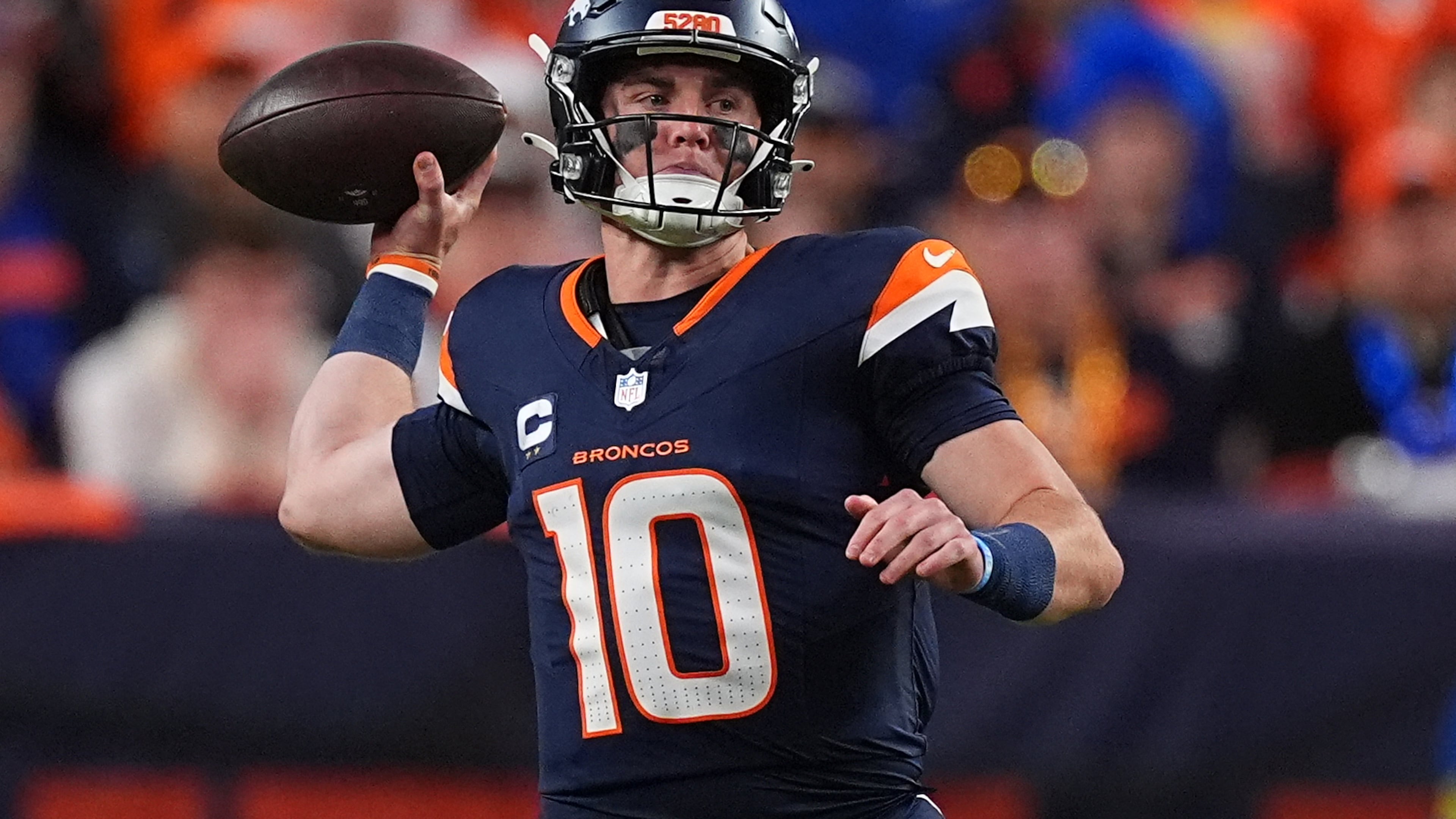 Denver Broncos quarterback Bo Nix (10) throws against the Cincinnati Bengals during the first half of an NFL football game Monday, Sept. 29, 2025, in Denver. (AP Photo/David Zalubowski)