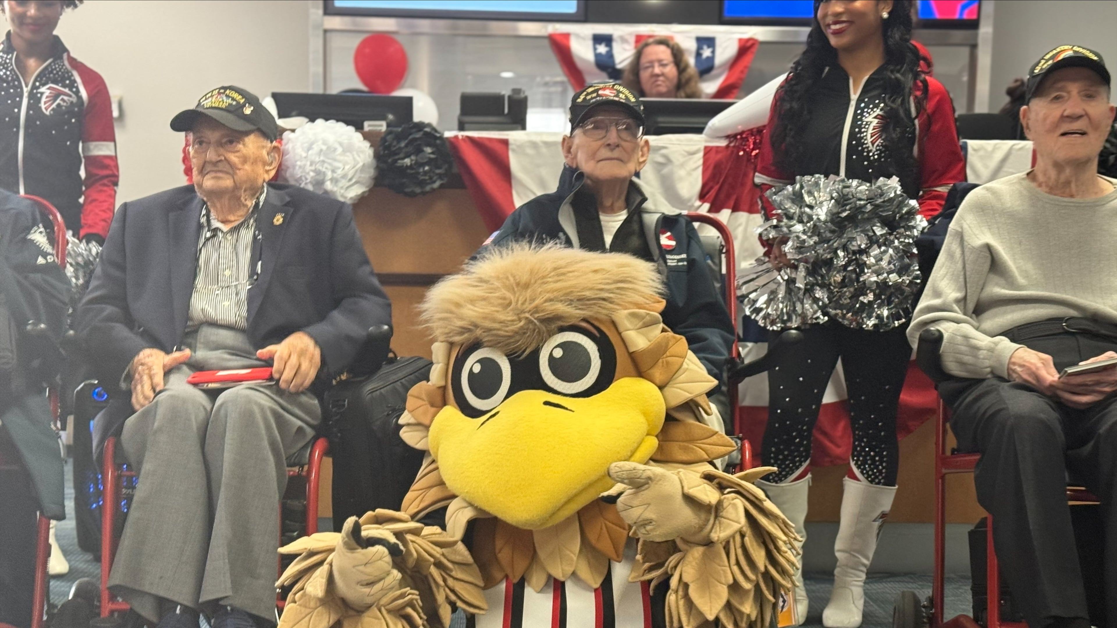 Hilbert Margol, far right, was one of five World War II veterans flown to Berlin for Sunday's NFL game between the Falcons and Colts. (Courtesy of Delta)