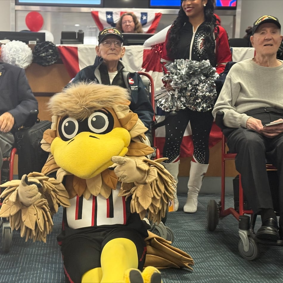 Hilbert Margol, far right, was one of five World War II veterans flown to Berlin for Sunday's NFL game between the Falcons and Colts. (Courtesy of Delta)