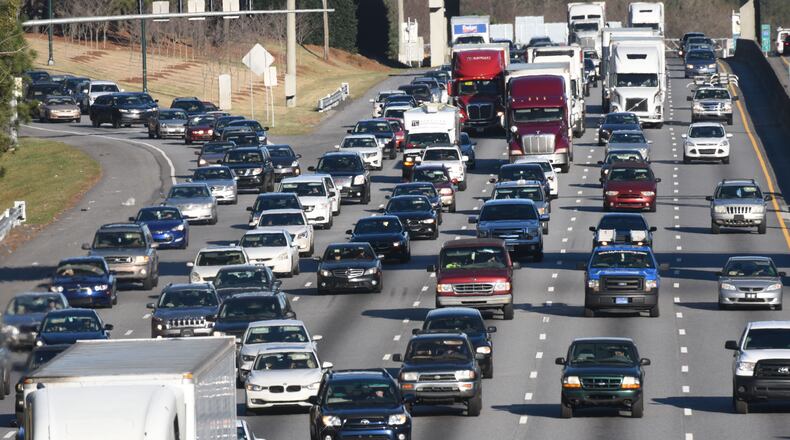 Traffic jam on I-285 westbound near Ashford-Dunwoody Road exit on a Wednesday afternoon early this year. HYOSUB SHIN / HSHIN@AJC.COM