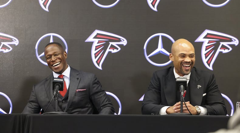 Atlanta Falcons coach Raheem Morris and general manager Terry Fontenot share a laugh while responding to a question Monday, Monday, Feb. 5, 2024, during Morris' introductory press conference. (Jason Getz/The Atlanta Journal-Constitution/TNS)