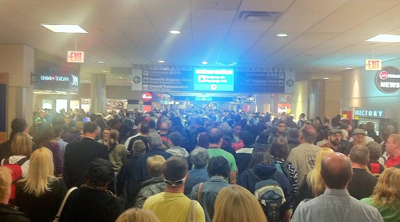 An electrical fire inside the Atlanta airport jammed passengers Thursday night. The “moving sidewalk” was temporarily closed for an investigation.